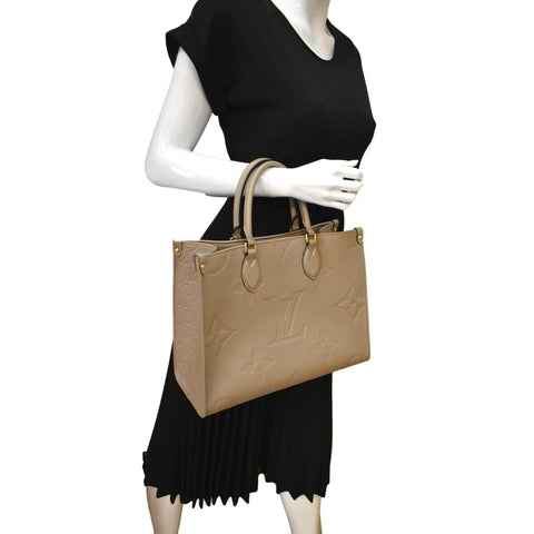 LOUIS VUITTON Onthego MM Monogram Empreinte Shoulder Bag Tourterelle  - Hot Deals