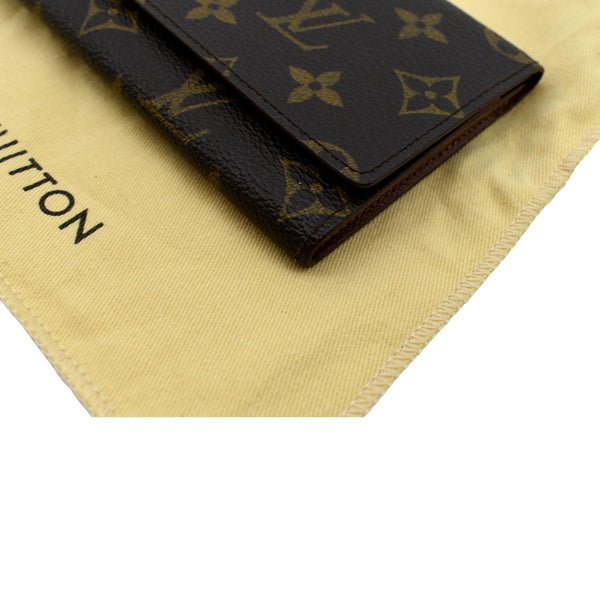 Louis Vuitton Fold Over Monogram Canvas Wallet in Brown - Bottom Right