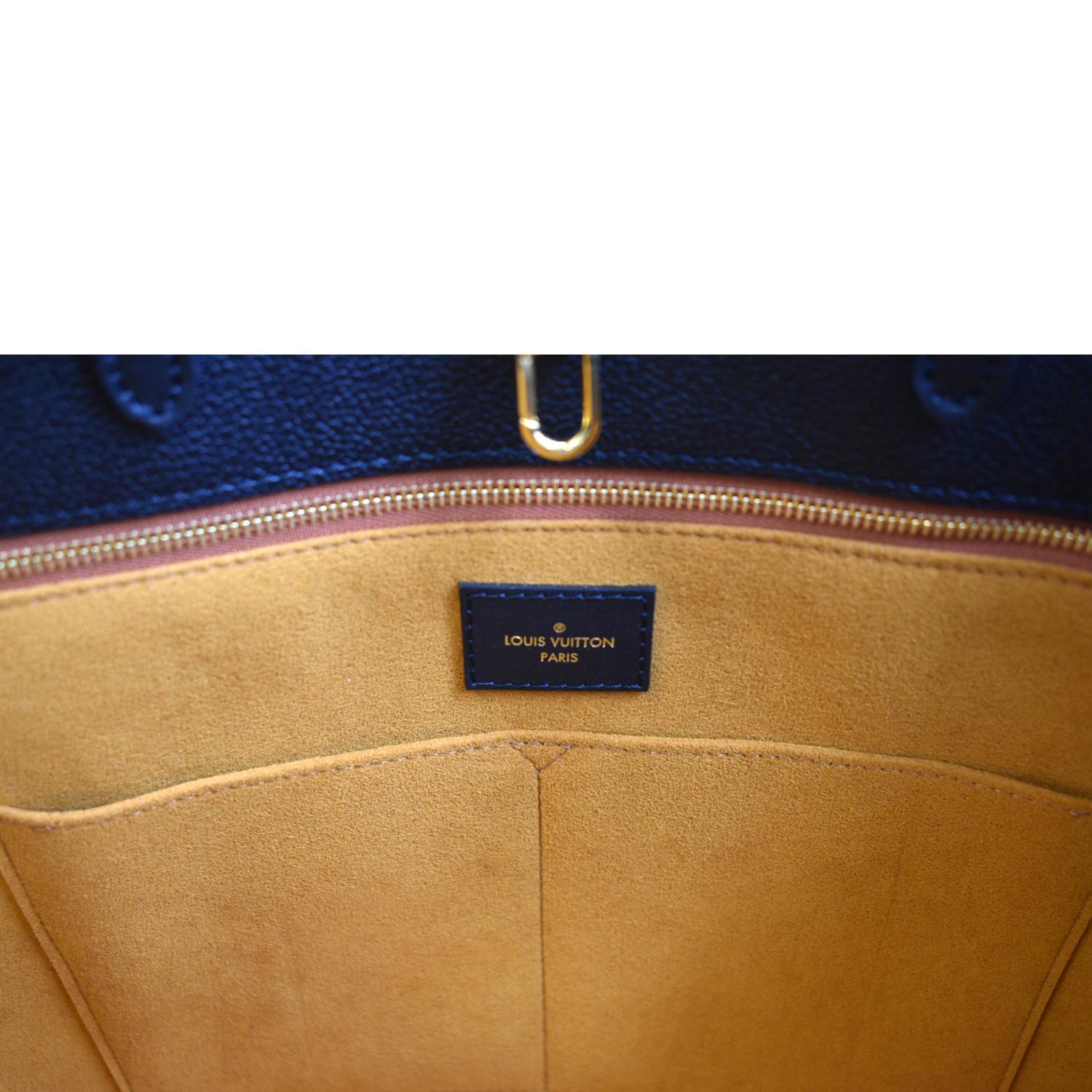 OnTheGo GM Bicolour Monogram Empreinte Leather - Handbags