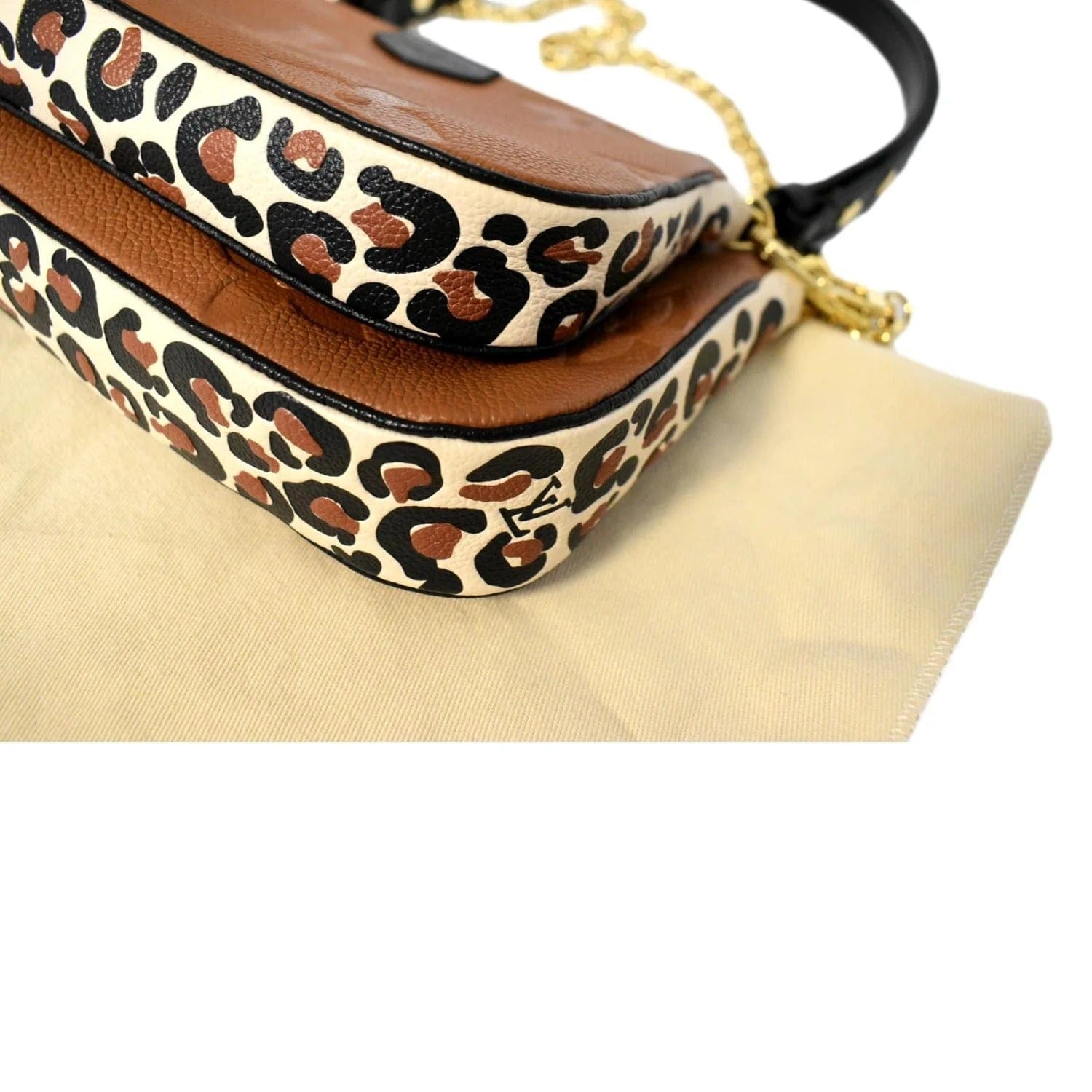 Louis Vuitton Pochette Melanie Wild at Heart Black in Cowhide Leather with  Gold-tone - US