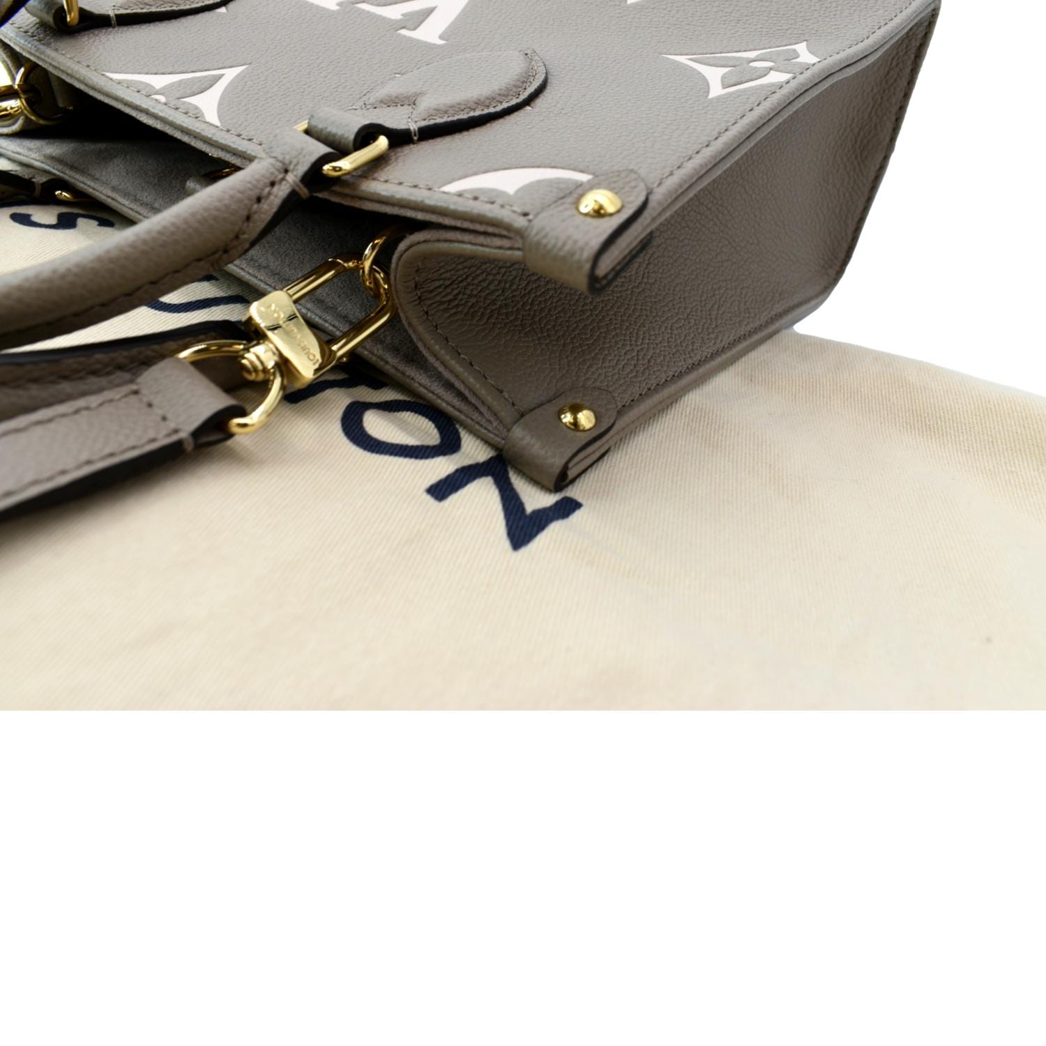OnTheGo GM Bicolor Monogram Empreinte Leather - Handbags