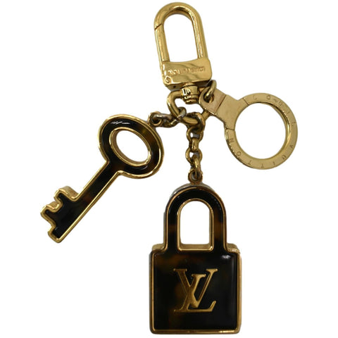 LOUIS VUITTON Resin Lock and Key Monogram Bag Charm Gold