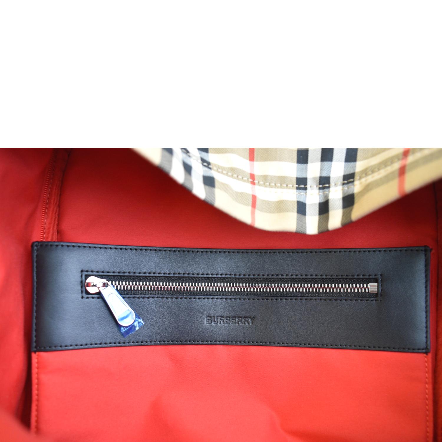 burberry colour block vintage check and leather backpack- blue/orange range Graffiti Print Large Rucksack Backpack Blue Antique Yellow 646215 FASHIONPHILE A backpack woven with the Burberry Check in signature sand beige Leather Backpacks Burberry Nova Check