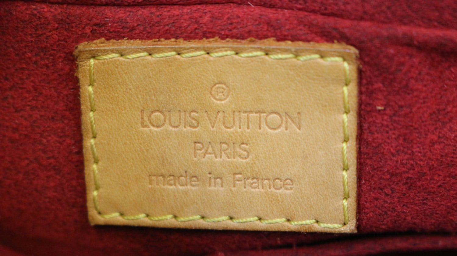 Ví cầm tay nam khóa số Louis Vuitton