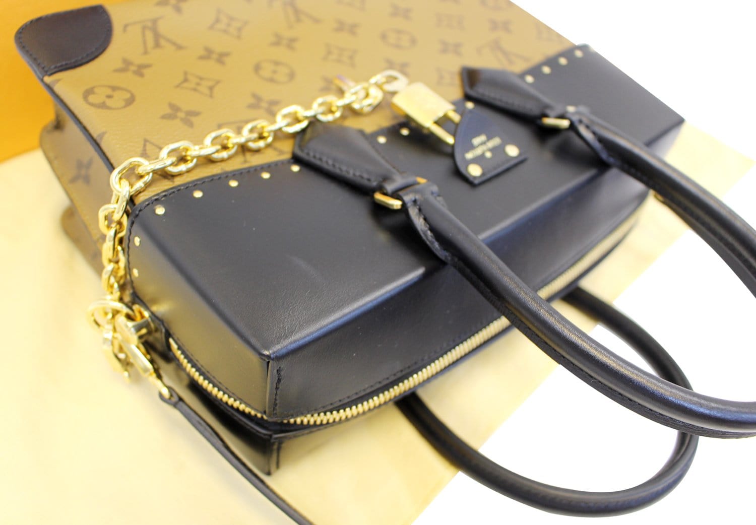 Louis Vuitton, Bags, Louis Vuitton City Malle Handbag Reverse Monogram  Canvas And Leather Mm