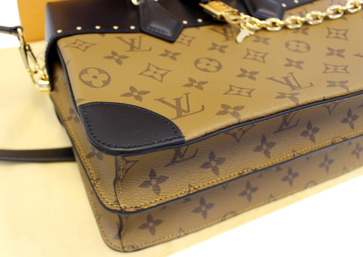 Louis Vuitton Trunk Clutch of Reverse Monogram Canvas with Polished Brass  Hardware, Handbags & Accessories Online, Ecommerce Retail