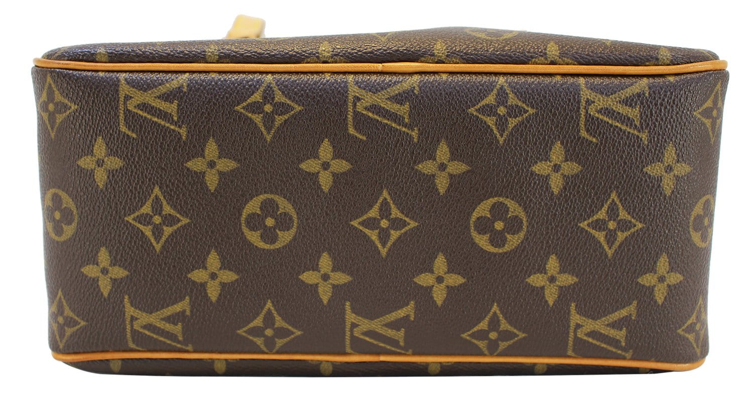 LOUIS VUITTON, Multiple Cite, bag, monogram canvas, lined, details in  leather and gold-colored brass, 3 outer pockets and 3 compartments inside,  marked LOUIS VUITTON PARIS made in France. Vintage clothing & Accessories 