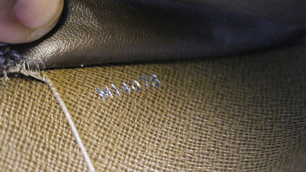 Louis Vuitton Atoll Organizer Taiga Wallet Brown interior