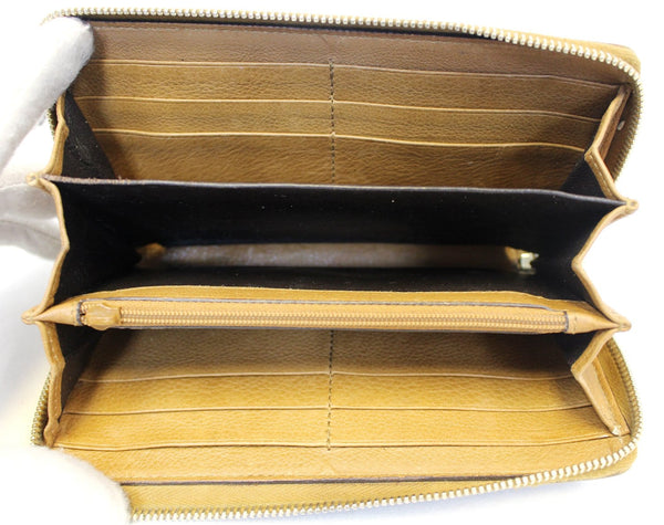 GUCCI GG Canvas Zip Around with Tassels Wallet 261393