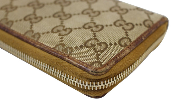 GUCCI GG Canvas Zip Around with Tassels Wallet 261393