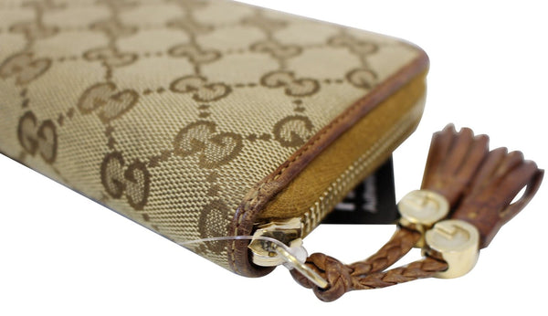 GUCCI GG Canvas Zip Around with Tassels Wallet 261393