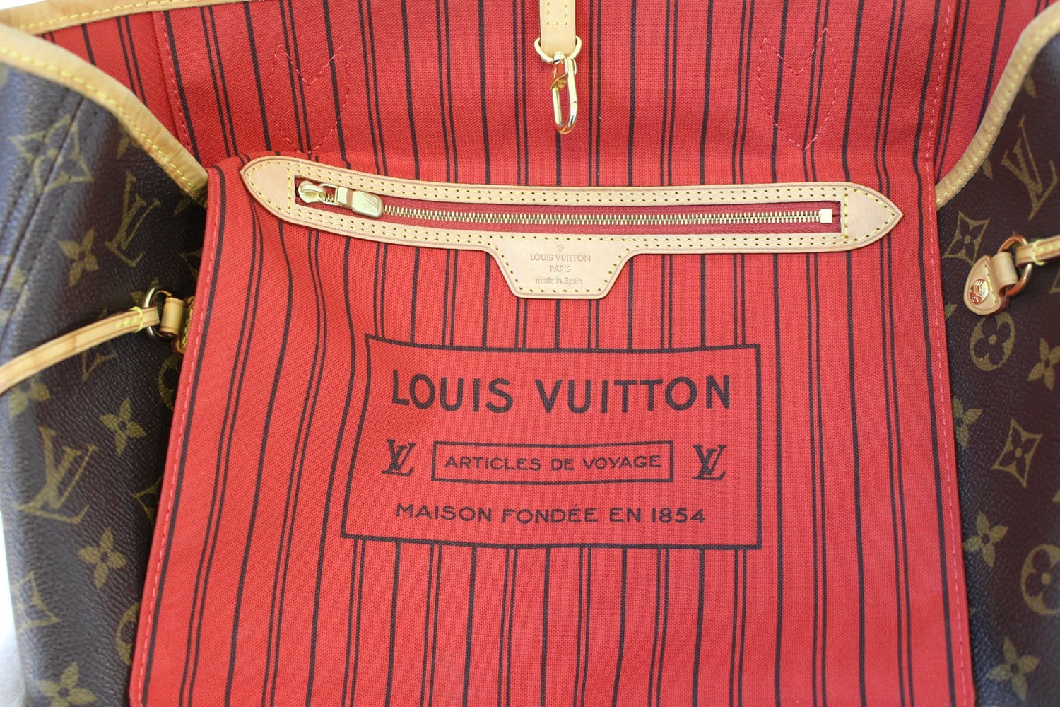 louis vuitton tote with red inside