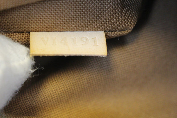 LOUIS VUITTON Monogram Canvas Pochette Valmy Shoulder Crossbody Bag