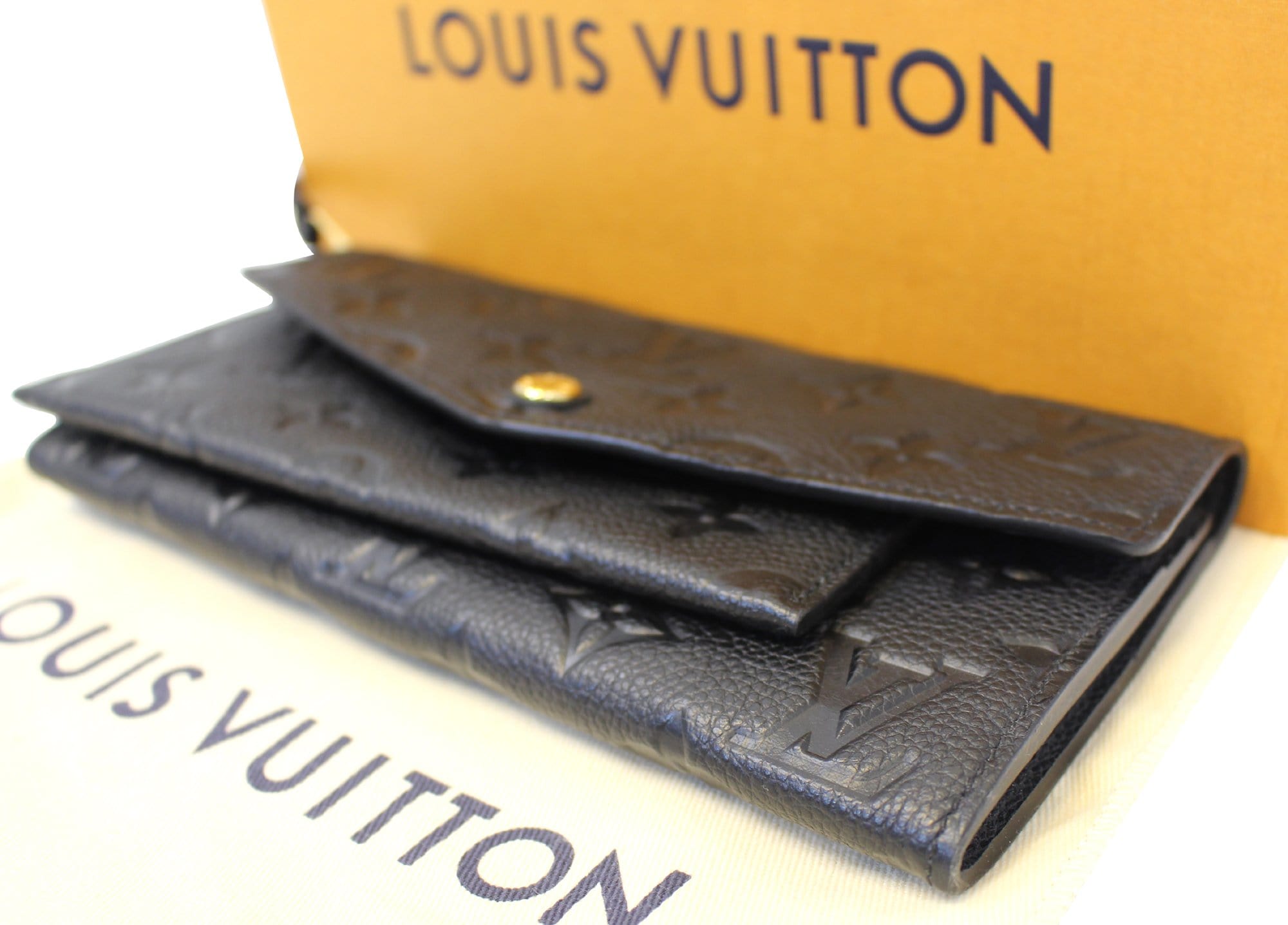 Louis Vuitton Black Monogram Empreinte Leather Curieuse Compact Wallet  Louis Vuitton | The Luxury Closet