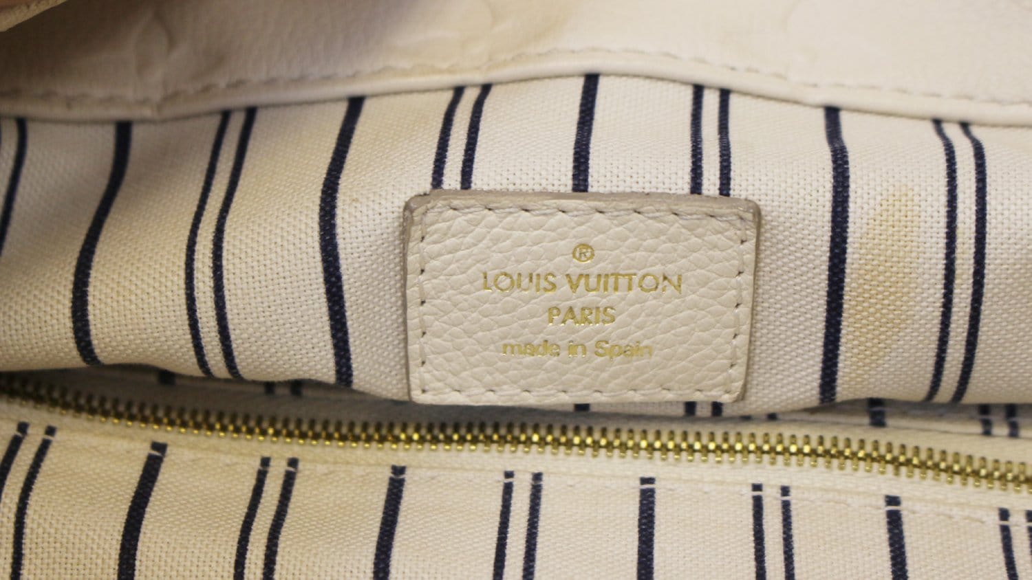 Louis Vuitton Neige Monogram Empreinte Leather Artsy MM Bag at 1stDibs
