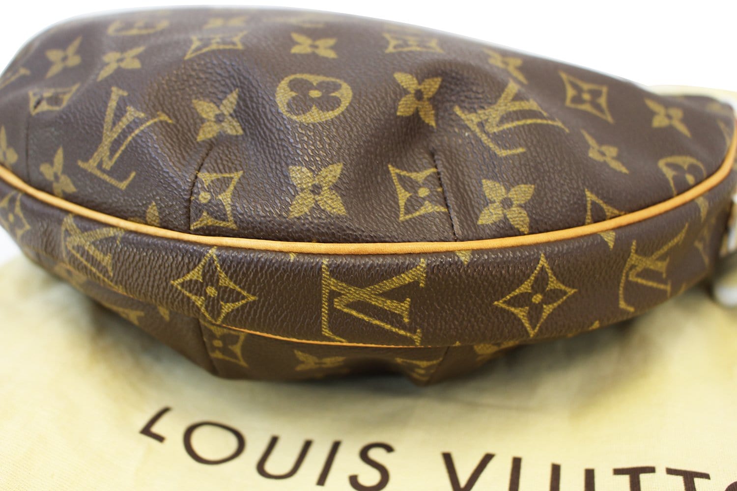 This monogram croissant bag is *chef's kiss* 🥐🤎😚✨ LOUIS VUITTON:  MONOGRAM CROISSANT MM: $1,299.00