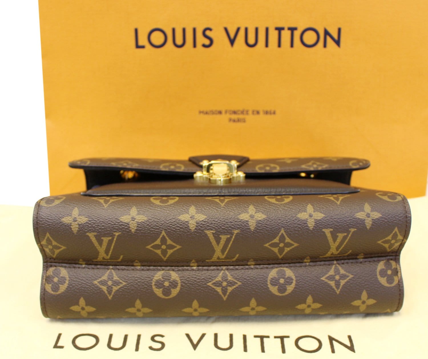 Louis Vuitton Monogram Canvas and Black Leather Victoire Bag at 1stDibs