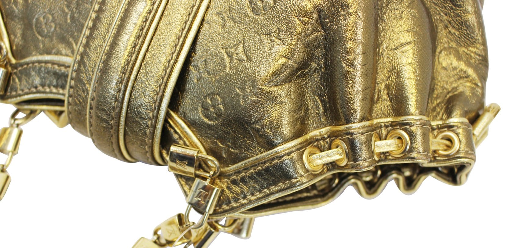 Louis Vuitton, Gold-plated and palladium-plated brass I.D.