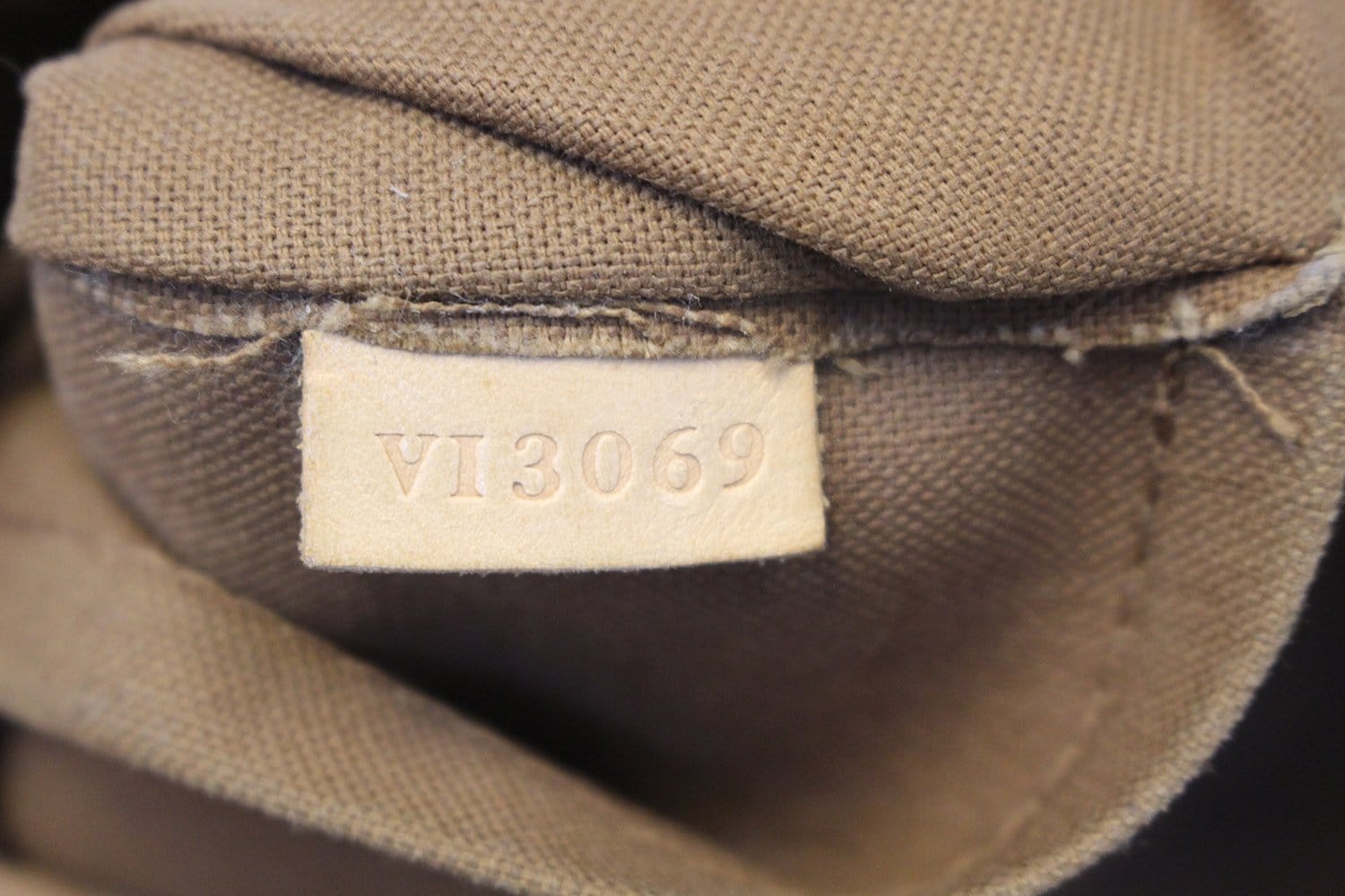Odéon leather handbag Louis Vuitton Brown in Leather - 38797328
