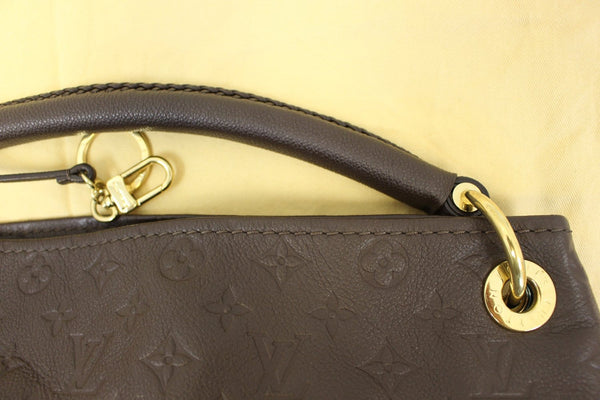 LOUIS VUITTON Terre Monogram Empreinte Leather Artsy MM Shoulder Bag