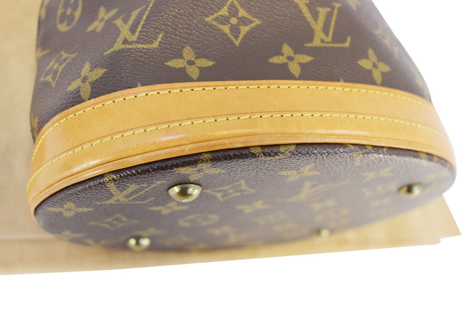 Louis Vuitton Vintage Monogram Petite Bucket Bag, $899, farfetch.com