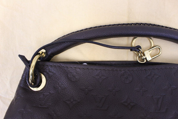 LOUIS VUITTON Terre Monogram Empreinte Leather Artsy MM Shoulder Bag