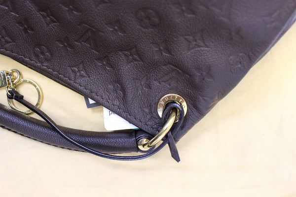 LOUIS VUITTON Terre Monogram Empreinte Leather Artsy MM Shoulder Bag