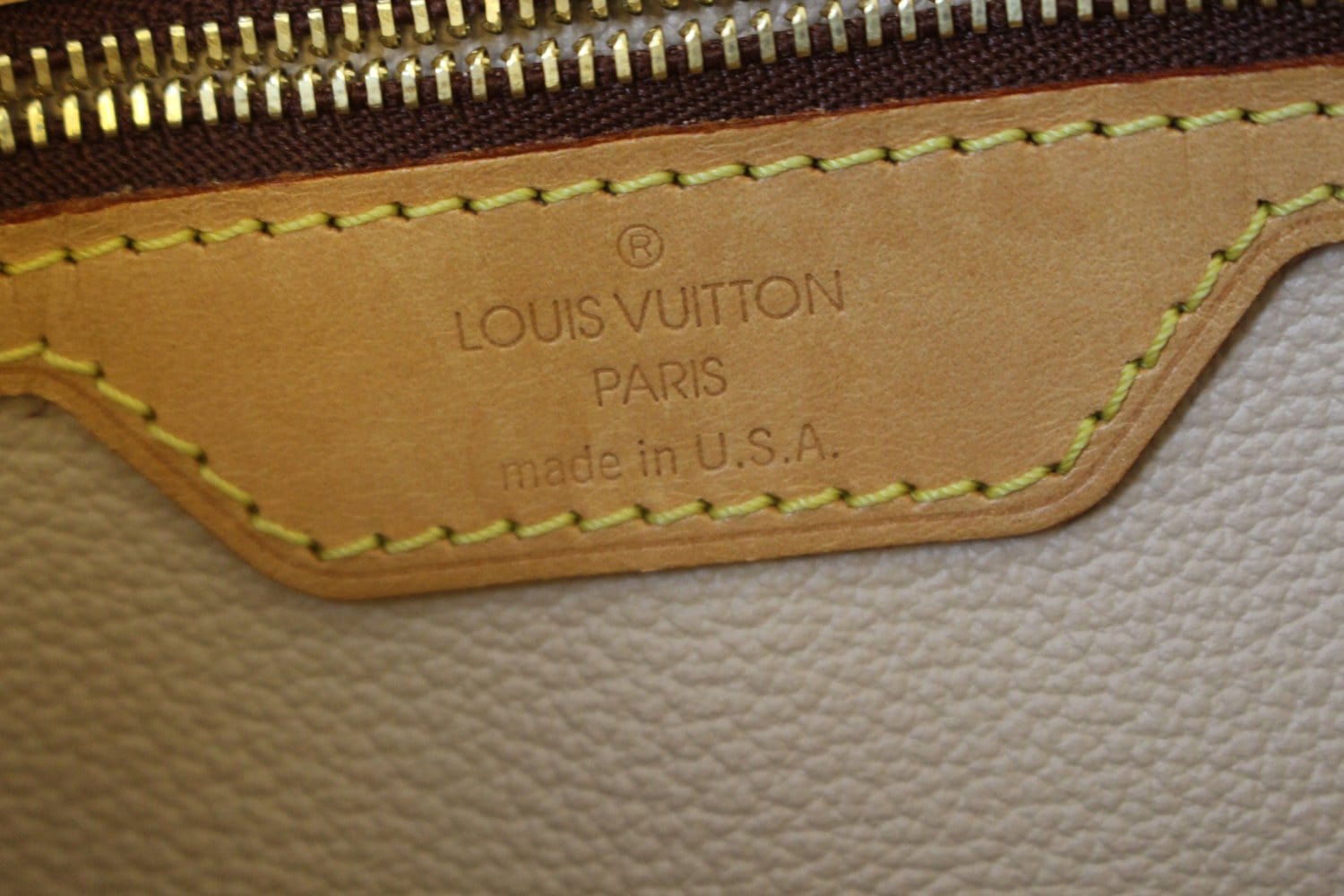 Louis Vuitton Petite Bucket Bag in Brown