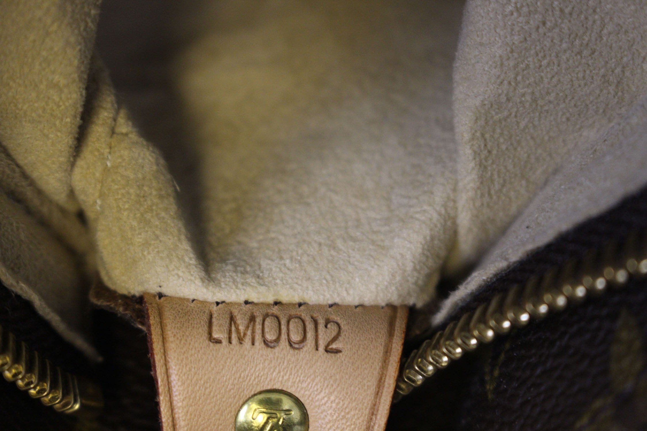 Louis Vuitton, a monogram canvas 'Looping' handbag, 2001. - Bukowskis