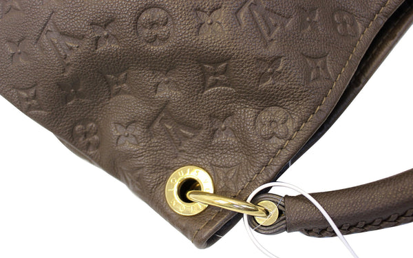 LOUIS VUITTON Terre Monogram Empreinte Leather Artsy MM Shoulder Bag